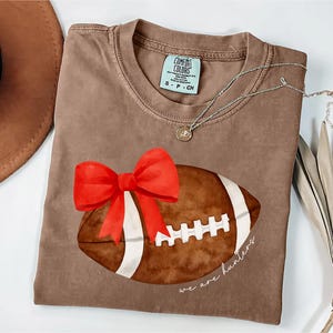 Comfort Colors® Coquette Football Shirt, Custom Mascot Bow Shirt, Ribbon Bows School Spirit T-shirt, Cheer Mascot Tee, Football Team Jersey