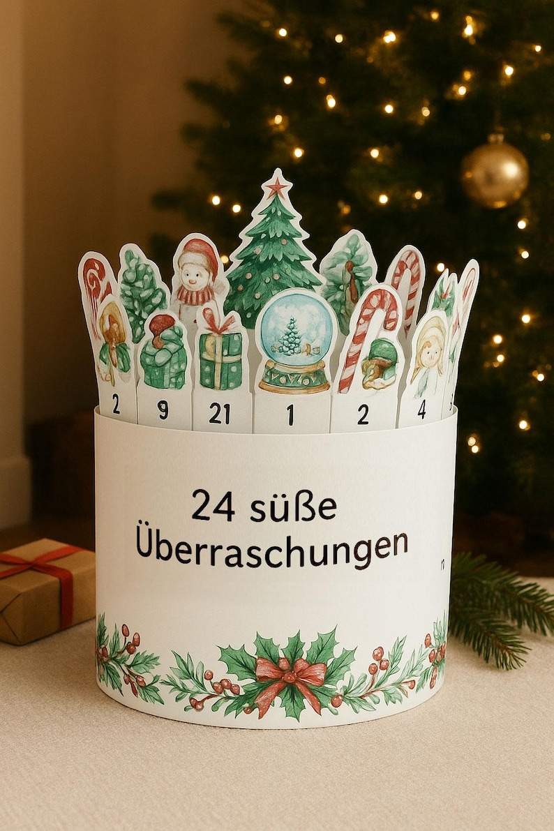 May include: A white Christmas advent calendar with 24 numbered cutouts featuring festive illustrations. The calendar has a holly and berry design at the base and the text "24 s&uuml;&szlig;e &Uuml;berraschungen". A small gift box is visible in the background.