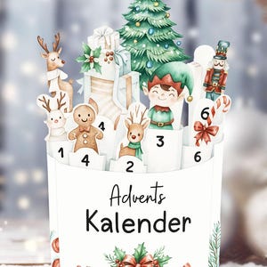 Puede incluir: Un calendario de Adviento blanco con ilustraciones de acuarela de personajes navideños, incluyendo renos, un elfo y un hombre de jengibre. El calendario tiene compartimentos numerados y las palabras "Advents Kalender".