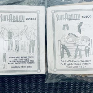 May include: Two equestrian pattern packets. The left packet is labeled "SUITABILITY #2900" and includes patterns for fleece vests, riding tights, and sweatpants. The right packet is labeled "SUITABILITY #2600" and includes patterns for Western or English chaps.