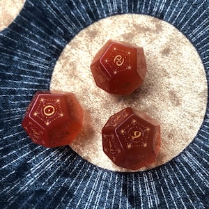 Engraved Orange Cat Eye Astrology Dice Set: Handcrafted Divination Tool