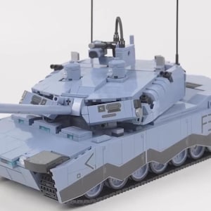 May include: A light blue toy tank with a black and grey tread. The tank has a long barrel and a turret with a black antenna. The tank has the letter "F3" on the side.