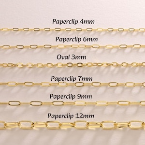 May include: A white ceramic mug with a black handle and the text "But First, Coffee" in a bold, black font. The mug is set against a blurred background, suggesting a cozy setting.