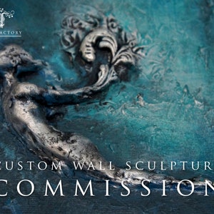 May include: An advertisement for a custom wall sculpture commission. The image shows a silver-toned figure set against a textured teal backdrop. White text reads "Custom Wall Sculpture Commission".