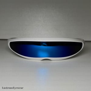 May include: White futuristic sunglasses with blue mirrored lenses.