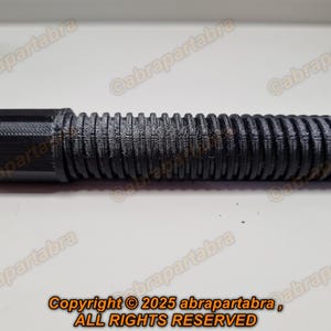 May include: A black, 3D printed, flexible, ribbed tube with a hexagonal end.