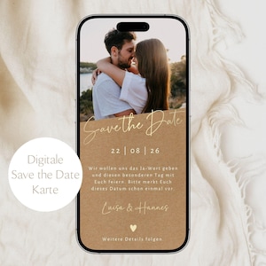 May include: A smartphone displays a digital "Save the Date" card. The card features a photo of a couple embracing, with text overlayed in elegant script. The date "22 | 08 | 26" is prominently displayed, along with additional text.