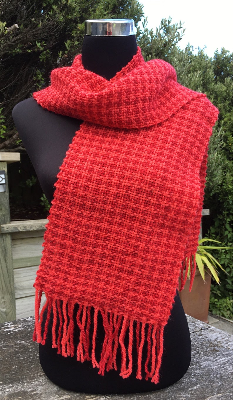 Handwoven wool scarf in red and pink houndstooth check image 3