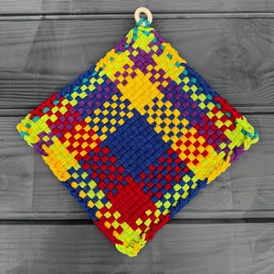 Niedliche Topflappen in fröhlich bunten Farben