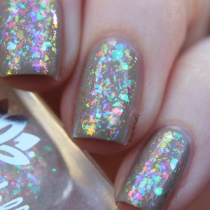 Iridescent nail polish - Cohesion - A  flakie nail polish with iridescent color shifting flakes.