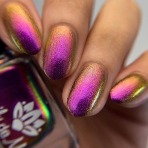 Nail polish - I Know The Cost - A multichrome nail polish that shifts from a purple / red-orange / gold /  golden green.