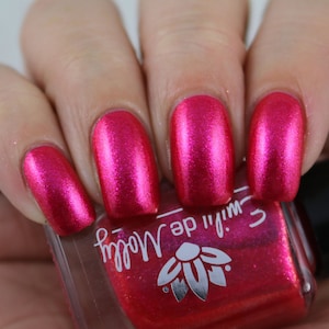 Crime Of Passion -  A magenta pink shimmer nail polish