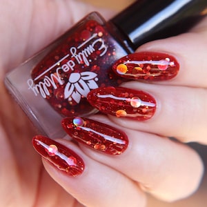 Glitter Nail Polish - Fierce Forces - Red jelly nail polish with large gold glitters