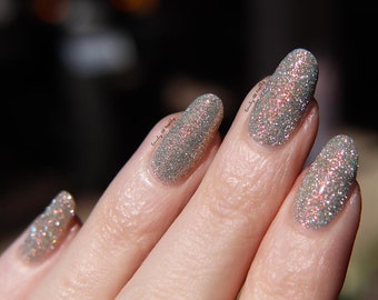 Reflective glitter polish - More Like Me - silver reflective glitters with a copper shimmer