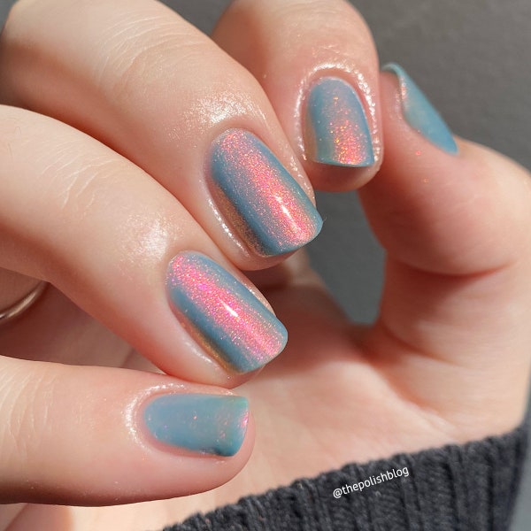 Shimmer nail polish - Cloud My Vision - A pale blue nail polish with a pink / orange / gold / green shifting shimmer.