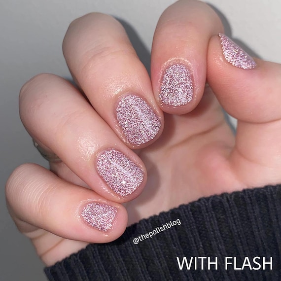 Pink nail polish with glitter discount