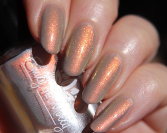 Nail Polish - Relics Of Time - A light grey nail polish with a strong copper / gold / green shifting aurora shimmer.