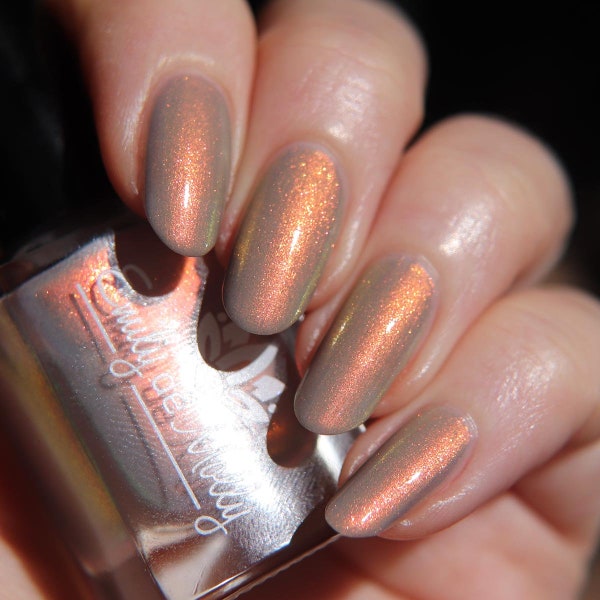 Nail Polish - Relics Of Time - A light grey nail polish with a strong copper / gold / green shifting aurora shimmer.