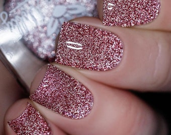Reflective glitter polish - Empire Of Trust - A rose toned brown nail polish with silver reflective micro glitters.