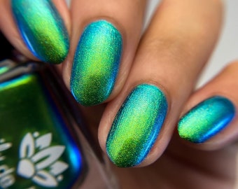 Nail polish - "Shift In Perception" A large particle multichrome pigment that shifts from an olive green / green /  blue.