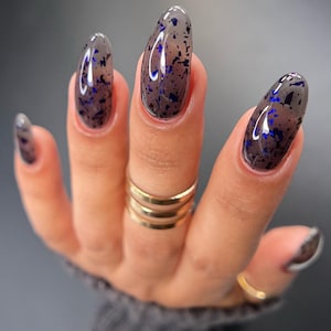 Jelly Nail Polish - Sheer Tint Nightshade - a sheer black jelly nail polish with flakes
