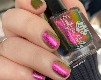 Nail polish - "Current Events" A large particle multichrome that shifts from a pink / copper / gold / green.