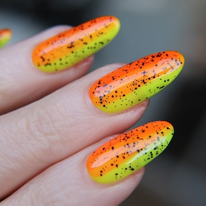 Black The Night -  A black glitter nail polish topper