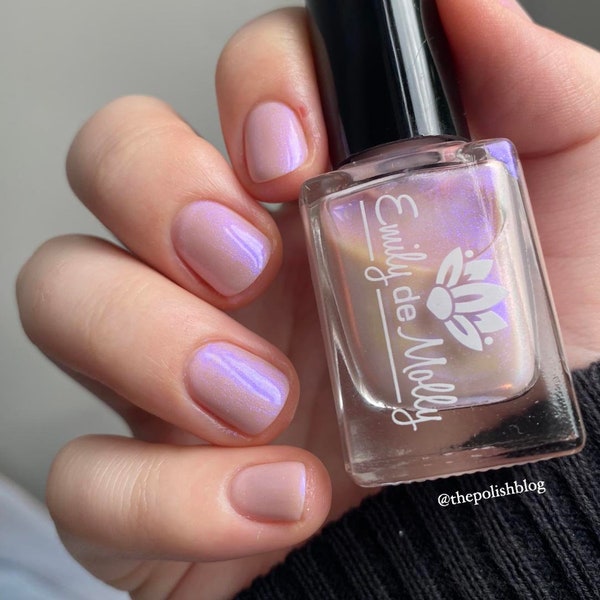 Nail polish - Nothing There - A pale pink nail polish with a purple aurora shimmer.