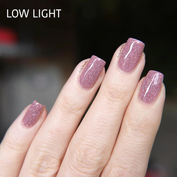 Reflective Nail Polish Quiet and Daring A Light Dusty Pink Nail