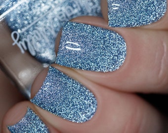 Ahead Of Myself -  A light dusty blue reflective nail polish