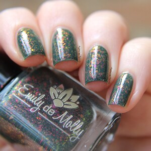 Nail polish The Dragon King A dark khaki nail polish filled with pink / orange / green iridescent flakes. image 6