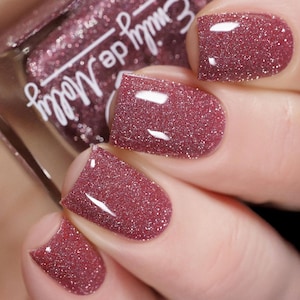 Reflective glitter polish - Empire Of Trust - A rose toned brown nail polish with silver reflective micro glitters.