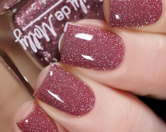 Reflective glitter polish - Empire Of Trust - A rose toned brown nail polish with silver reflective micro glitters.