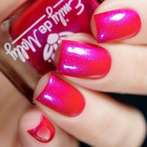 Nail polish Volume Up A pink nail polish with a blue / purple aurora shimmer. image 9