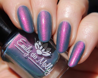 Shimmer nail polish - Secrets To Keep - A medium dusty blue crelly nail polish with a strong pink / orange / gold / green shifting shimmer.