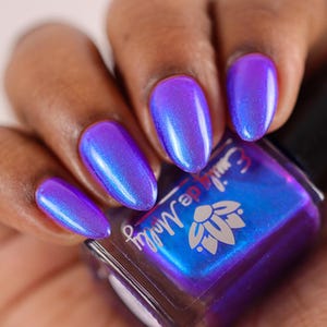 Nail Polish - Code Mistake - A medium purple nail polish with a strong blue aurora shimmer.