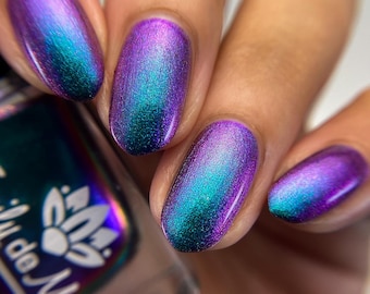 Nail polish - "See For Miles" A large particle multichrome that shifts from a green / blue /  purple / red-orange.