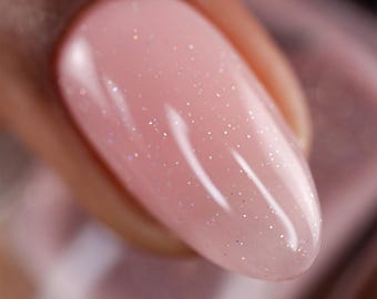 Jelly Nail Polish - Sheer Tint Illusion - A pale rosy brown jelly nail polish, with silver holographic micro glitters.