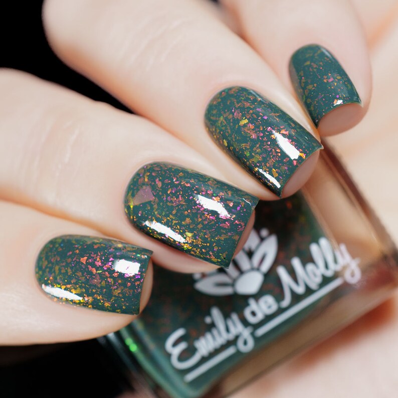 Nail polish The Dragon King A dark khaki nail polish filled with pink / orange / green iridescent flakes. image 1