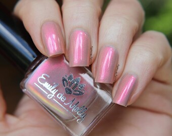 Nail polish - "Lost Your Touch" A light pinky beige base with a pink / orange / gold / green shifting aurora shimmer.