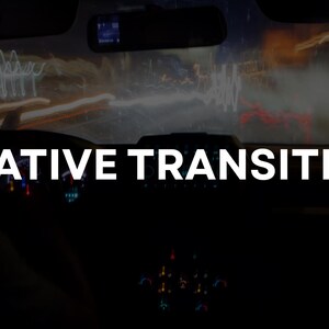 May include: Dark interior shot of a car at night with the text "CREATIVE TRANSITIONS" in white. The windshield shows blurred streaks of light from passing vehicles, suggesting motion and speed. The dashboard lights are visible.