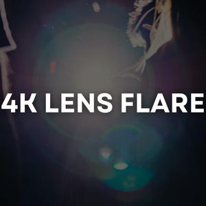 May include: A dark image with a bright lens flare effect. The text "4K LENS FLARE" is displayed in white, centered horizontally. The background is a gradient of dark colors, with hints of blue and green.