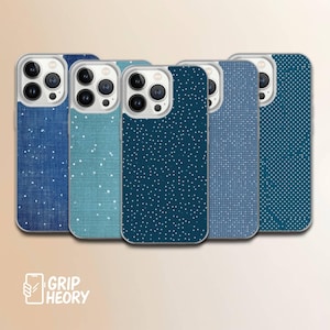 May include: A collection of five phone cases with various blue patterns. The cases feature designs including a denim-like texture, scattered white dots, and a grid pattern. The cases have a clear border and a camera cutout.