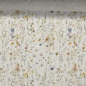 May include: A floral pattern with a variety of wildflowers in shades of yellow, purple, and beige against a light background. The design showcases delicate stems and blooms, creating a natural, botanical theme.