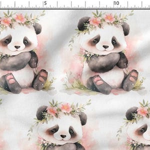 May include: A repeating pattern featuring watercolour illustrations of pandas. Each panda has black and white fur, a floral crown, and pink accents. The background is a soft, pink watercolour wash.