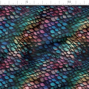 May include: A textile featuring a repeating pattern of overlapping, rounded shapes, reminiscent of scales. The design incorporates a gradient of colours, including blue, purple, green, and brown, creating a textured, iridescent effect. The overall theme suggests a fantasy or aquatic aesthetic.