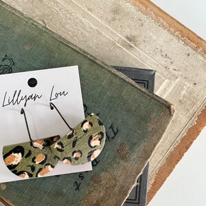 Modern green earrings // leather drop earrings // green statement earrings // cheetah print // teardrop earrings // cheetah pattern //modern