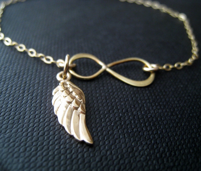 Angel wing bracelet meaning Clearance
