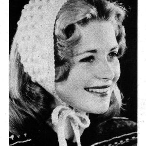 May include: A black and white image of a woman wearing a white popcorn-stitch headband. The headband is tied under the chin with a white ribbon. The text at the bottom reads "WHITE POPCORN-STITCH HEADBAND."