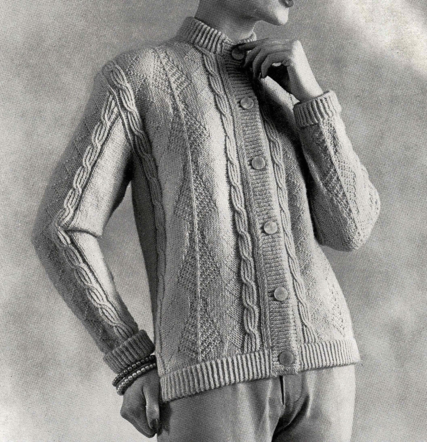 white cable knit button down sweater